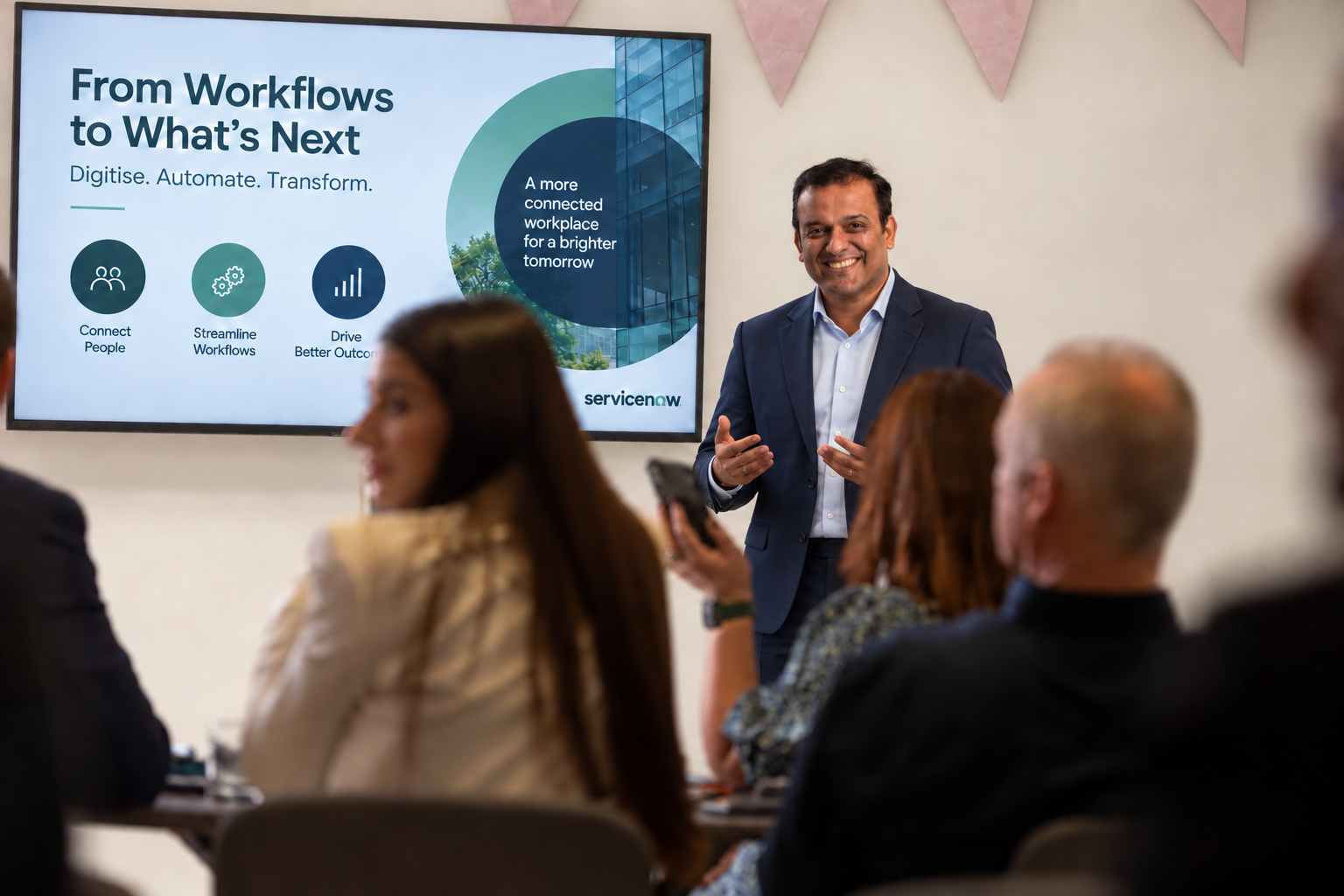 Manish presenting to a group
